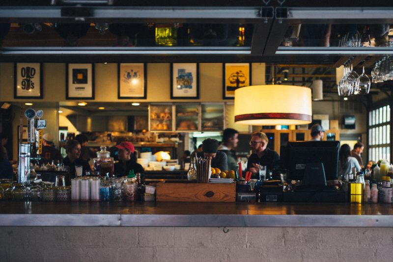 A shop counter taking card payments, Photo by Serge Esteve on Unsplash