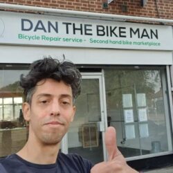 Dan the Bike man Feltham outside his bike shop